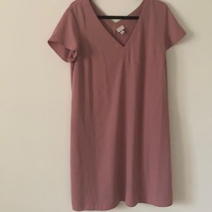 Cute dress can be dressed up or down. Never worn